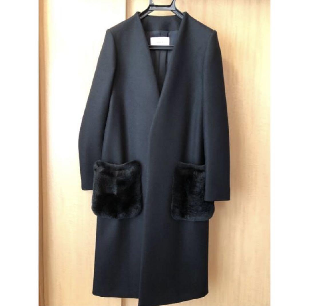 Black long coat with fur-trimmed pockets - Astrat