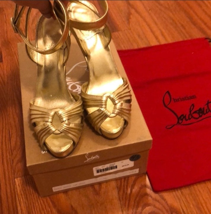 Christian Louboutin gold heels