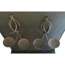Pair of metal wall hanging candle holders