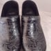 Dansko 38 black tooled leather clogs