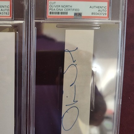 OLIVER NORTH HAND SIGNED CUT SIGNATURE AUTO PSA SLABBED