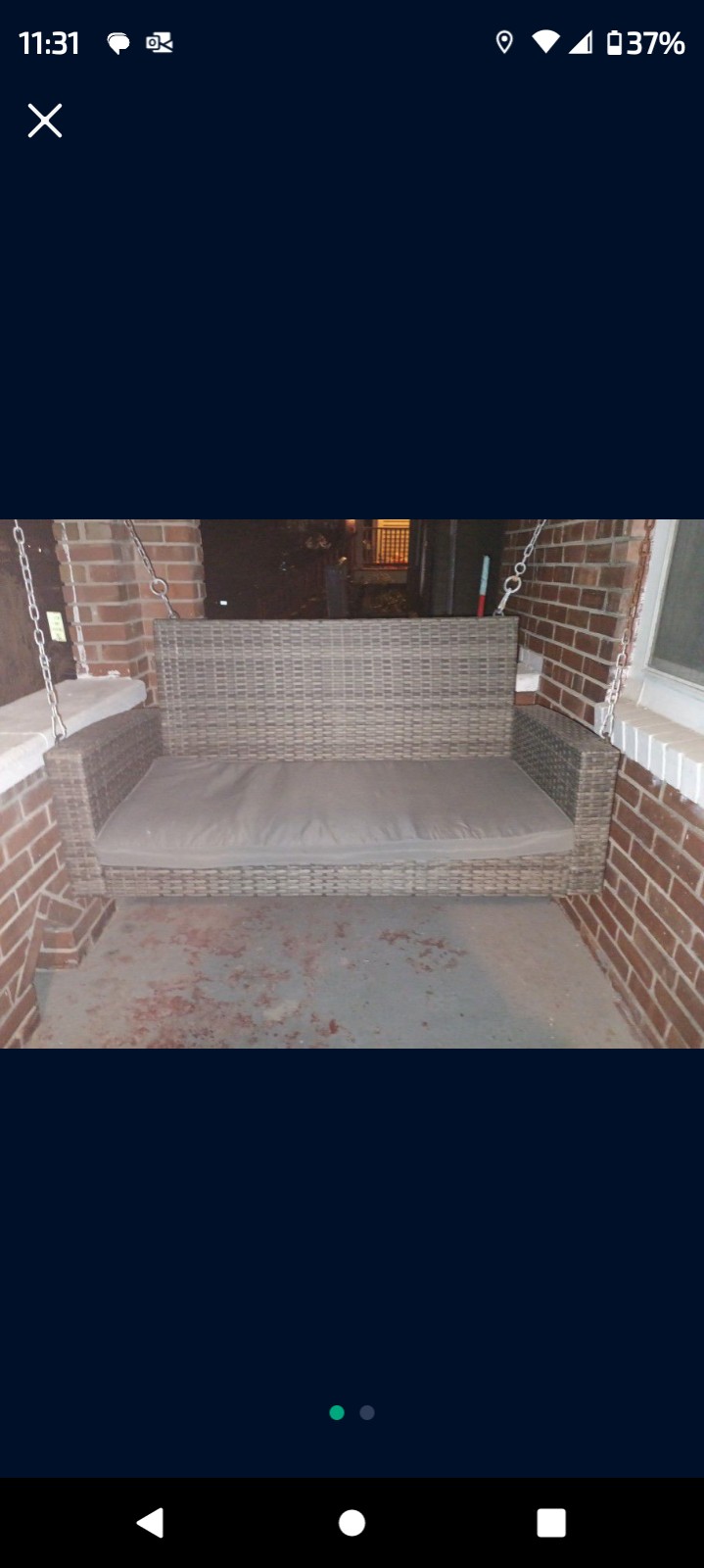 Wicker porch swing