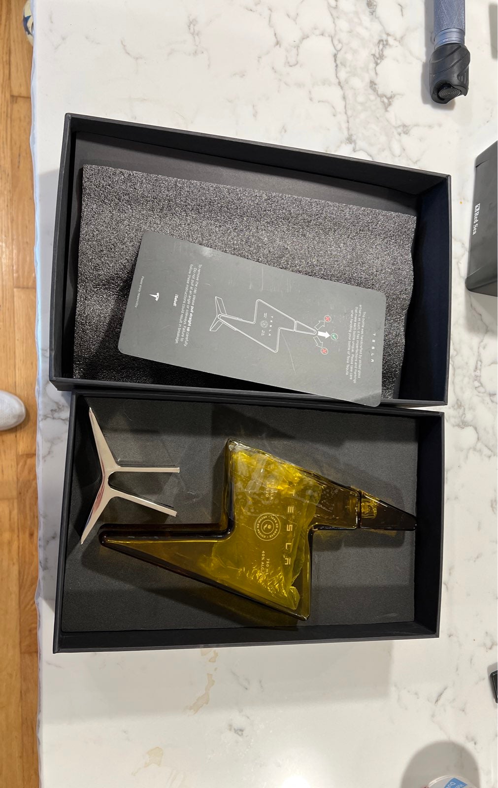 Tesla Tequila bottle with stand + box~ BROKEN READ