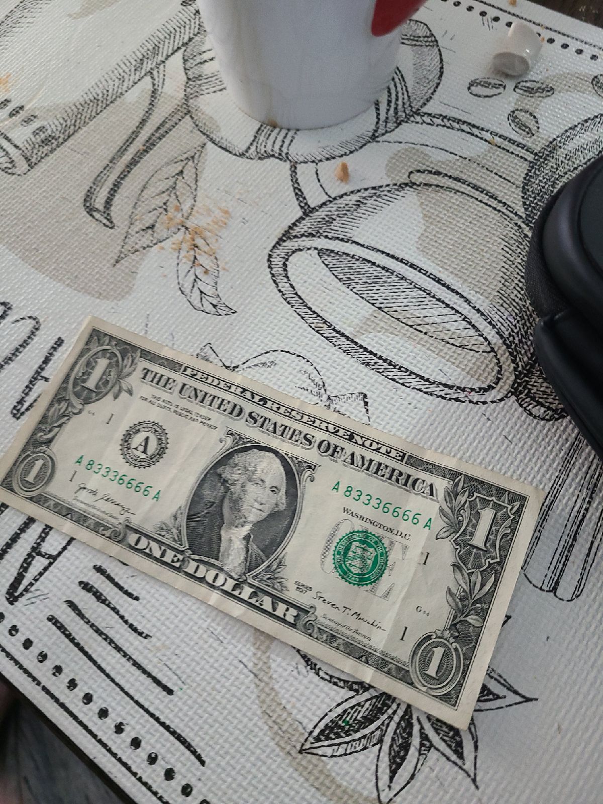 Fancy serial number dollar bill