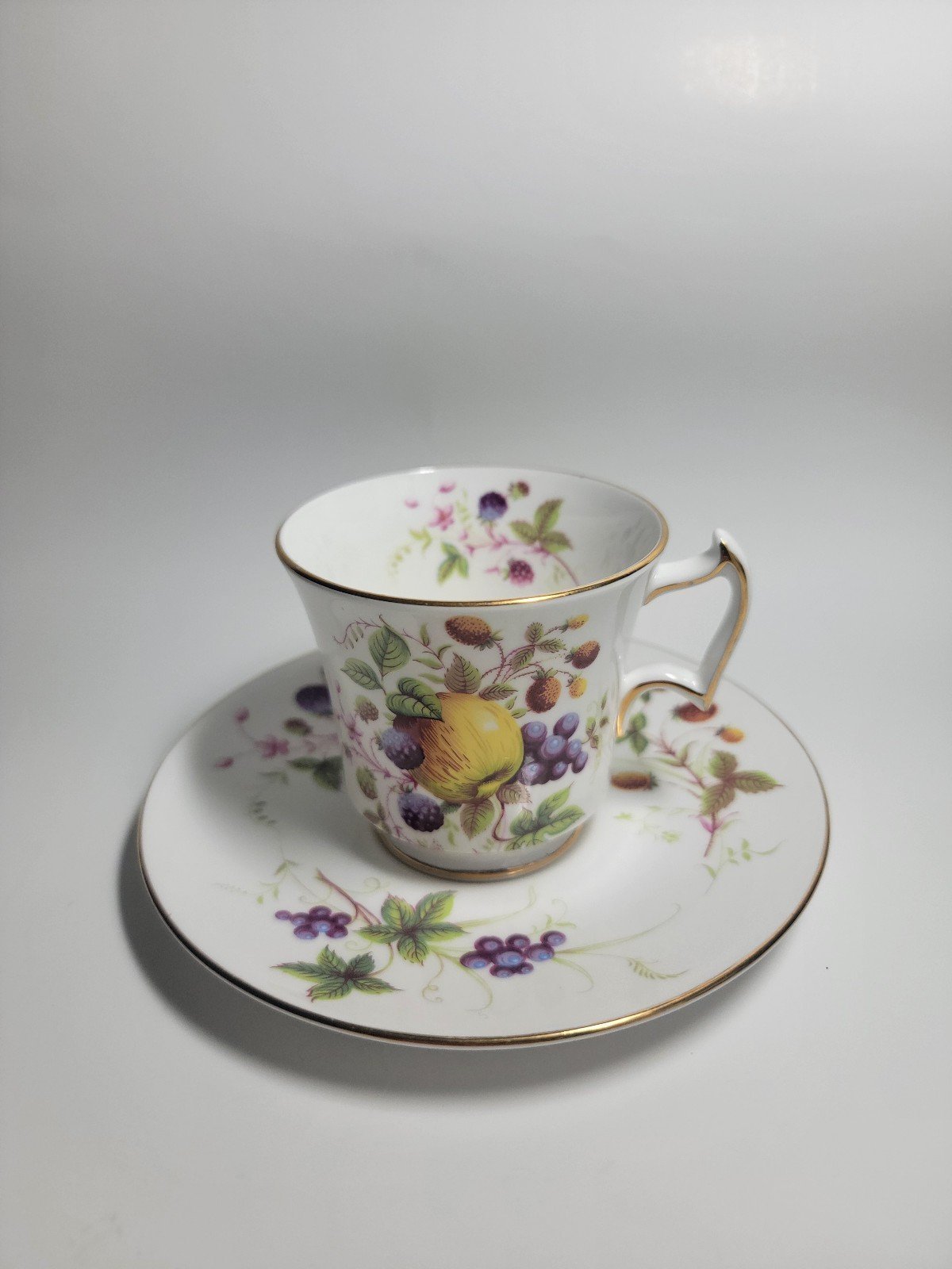 Royal Chelsea English Bone China Fruit Themed Tea Cup and Saucer Set.