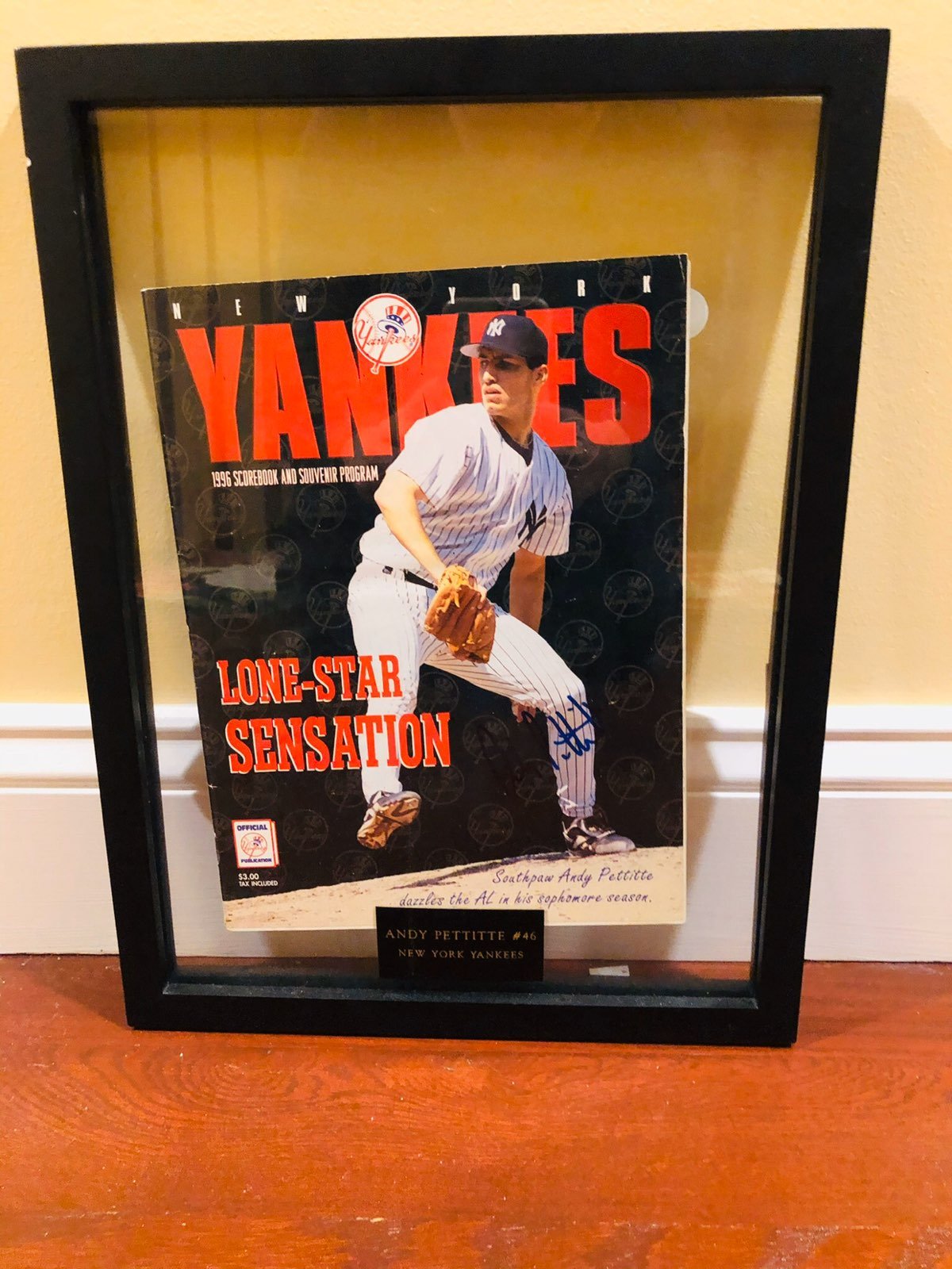 Andy Petitte signed and framed magazine