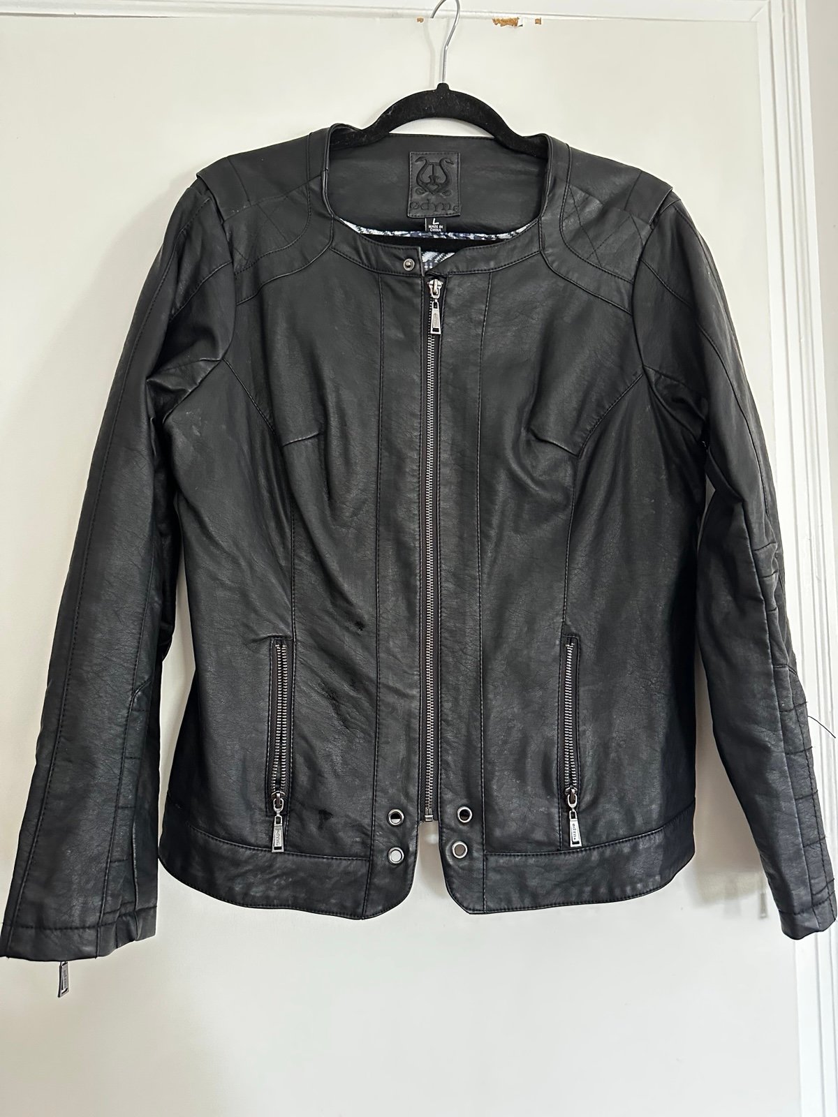 Odyn Women’s large Black Vegan Leather Moto Jacket. Quilted sides Metal Accents