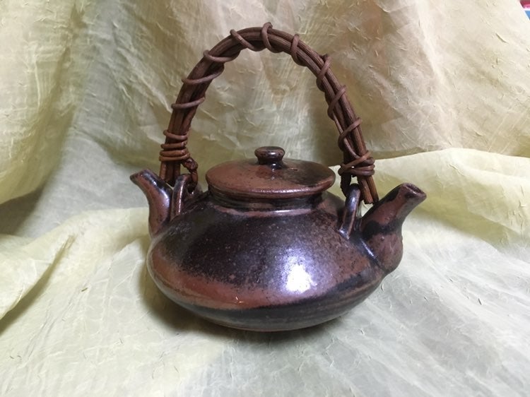 handmade double spout teapot