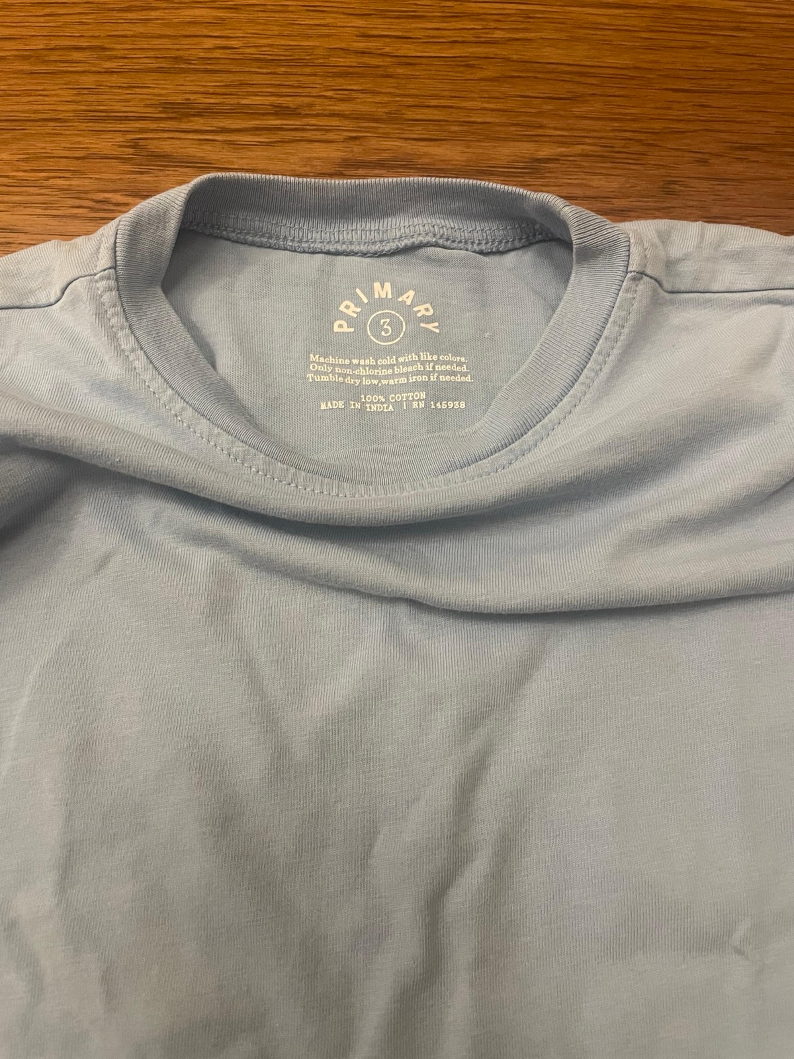 Primary size 3 light blue shirt
