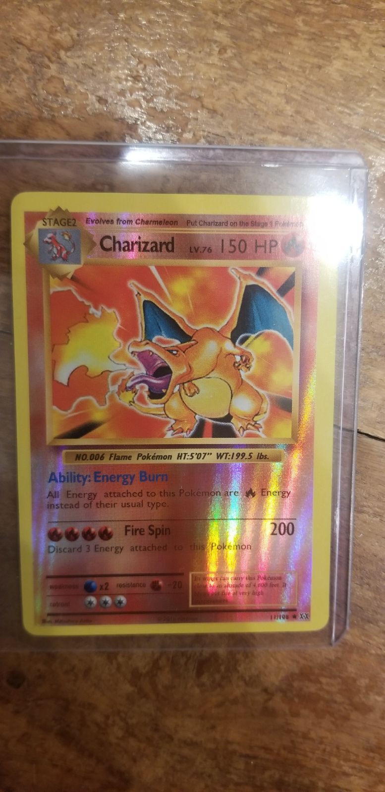 Charizard reverse Holo 11/108 in case
