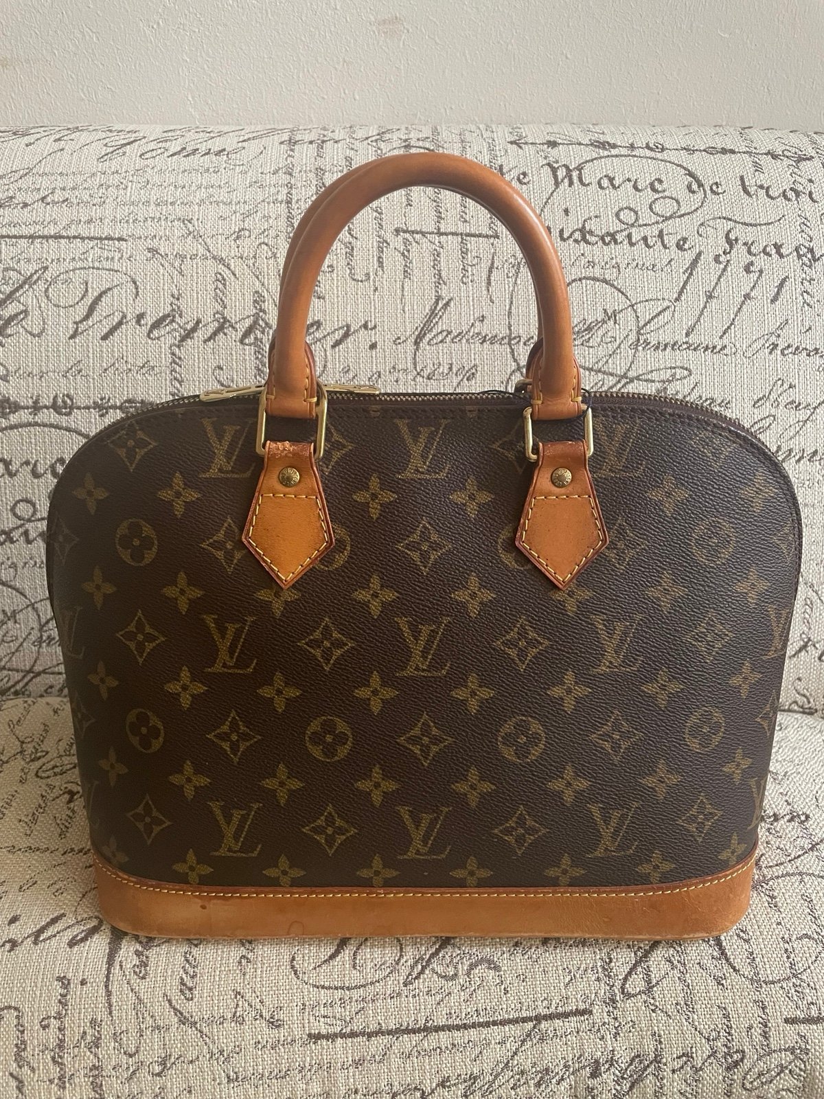 Authentic louis Vuitton Alma handbags