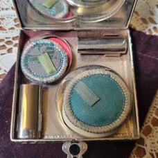 D .F. B. Co vintage powder compact
