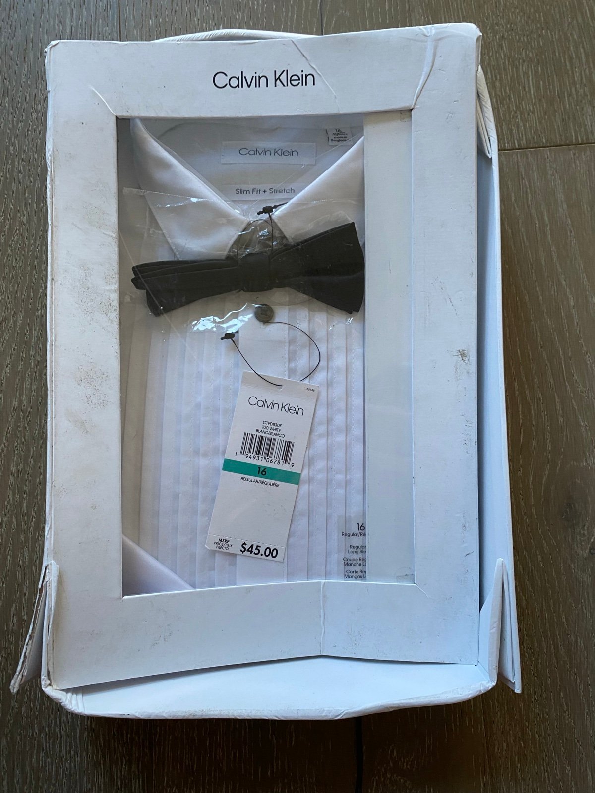 Calvin Klein white button-down shirt and bow tie