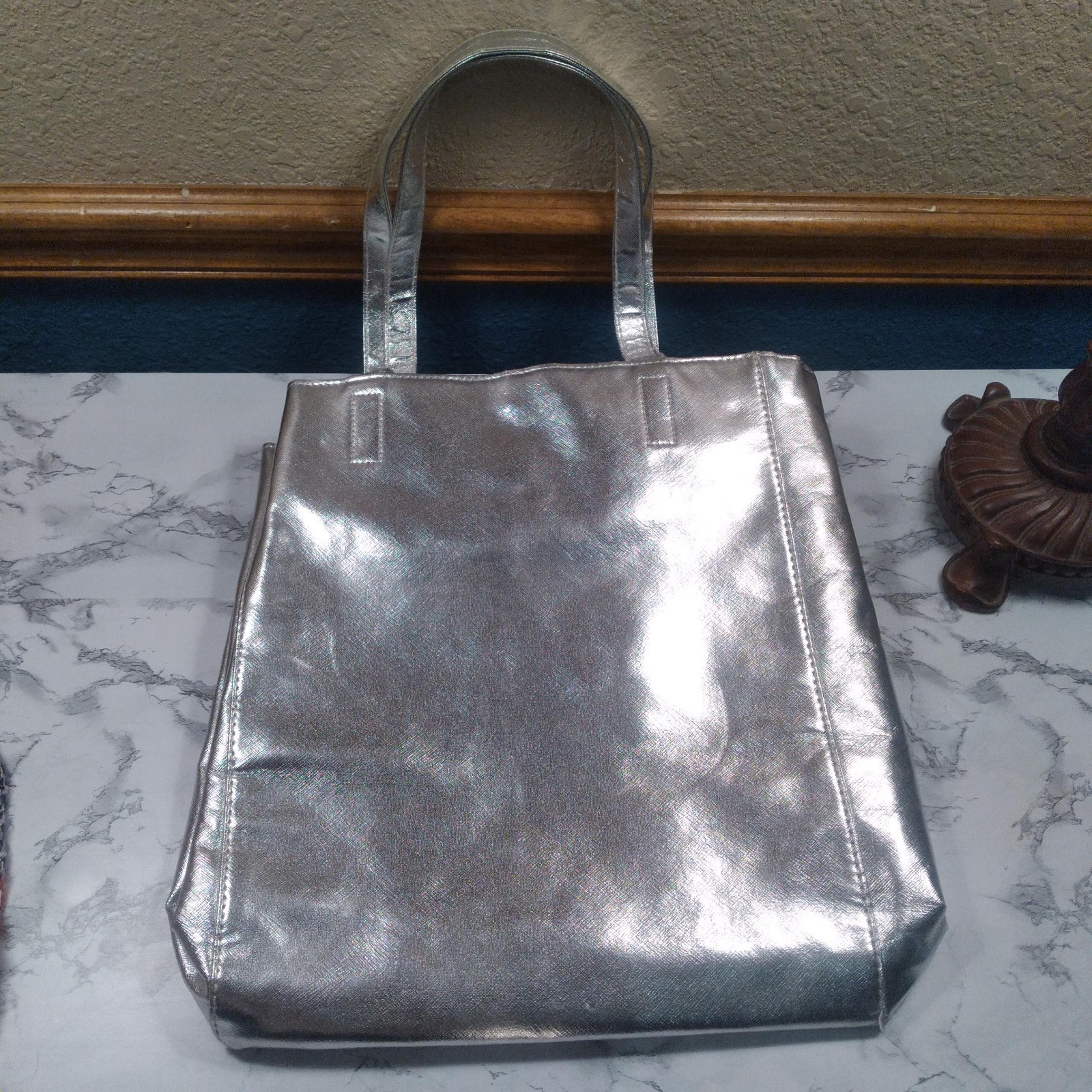 Vince Camuto new silver purse.