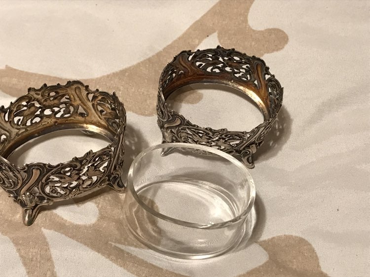 Silver repousse cups and glass