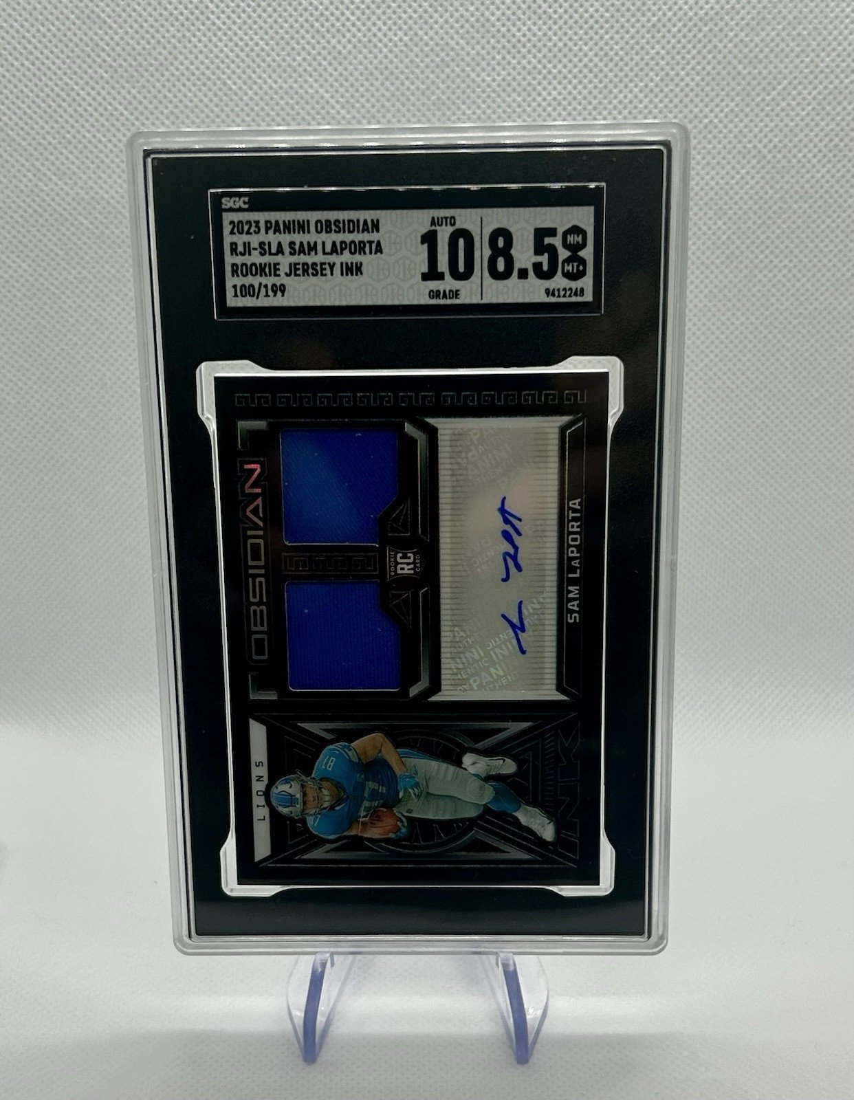 2023 Obsidian Rookie Jersey Ink #RJI-SLA Sam LaPorta /199 (AU, MEM, RC) SGC 8.5