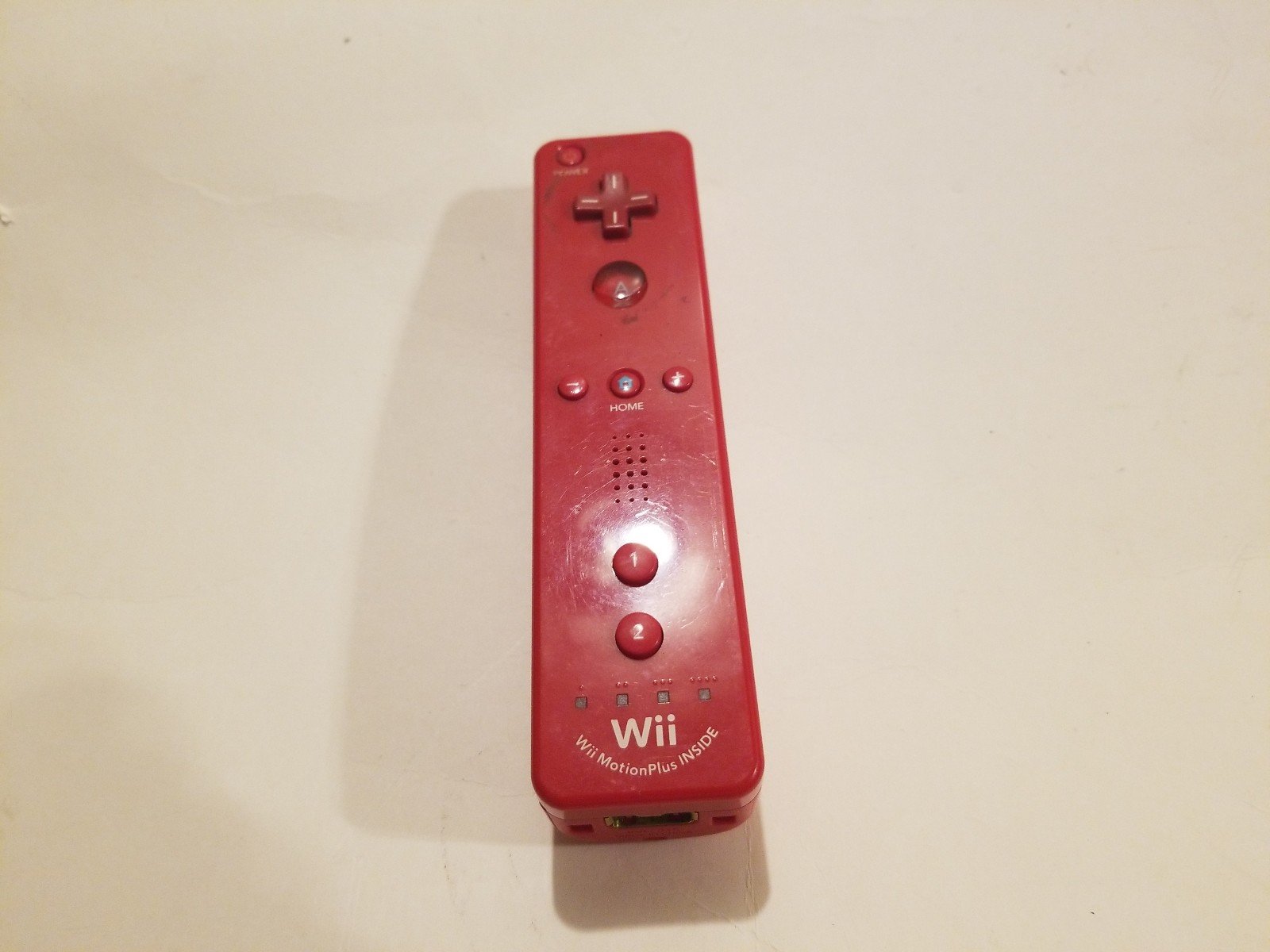 Red Nintendo Wii Motion Plus Controller
