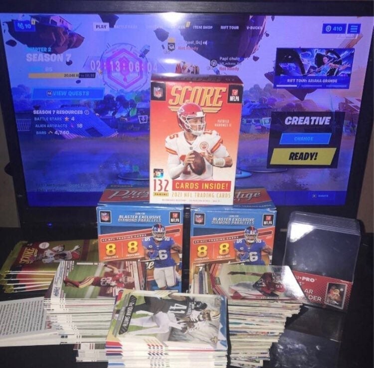 NFL score and prestige lot 300 cards packs are not included top loaders 1 doller