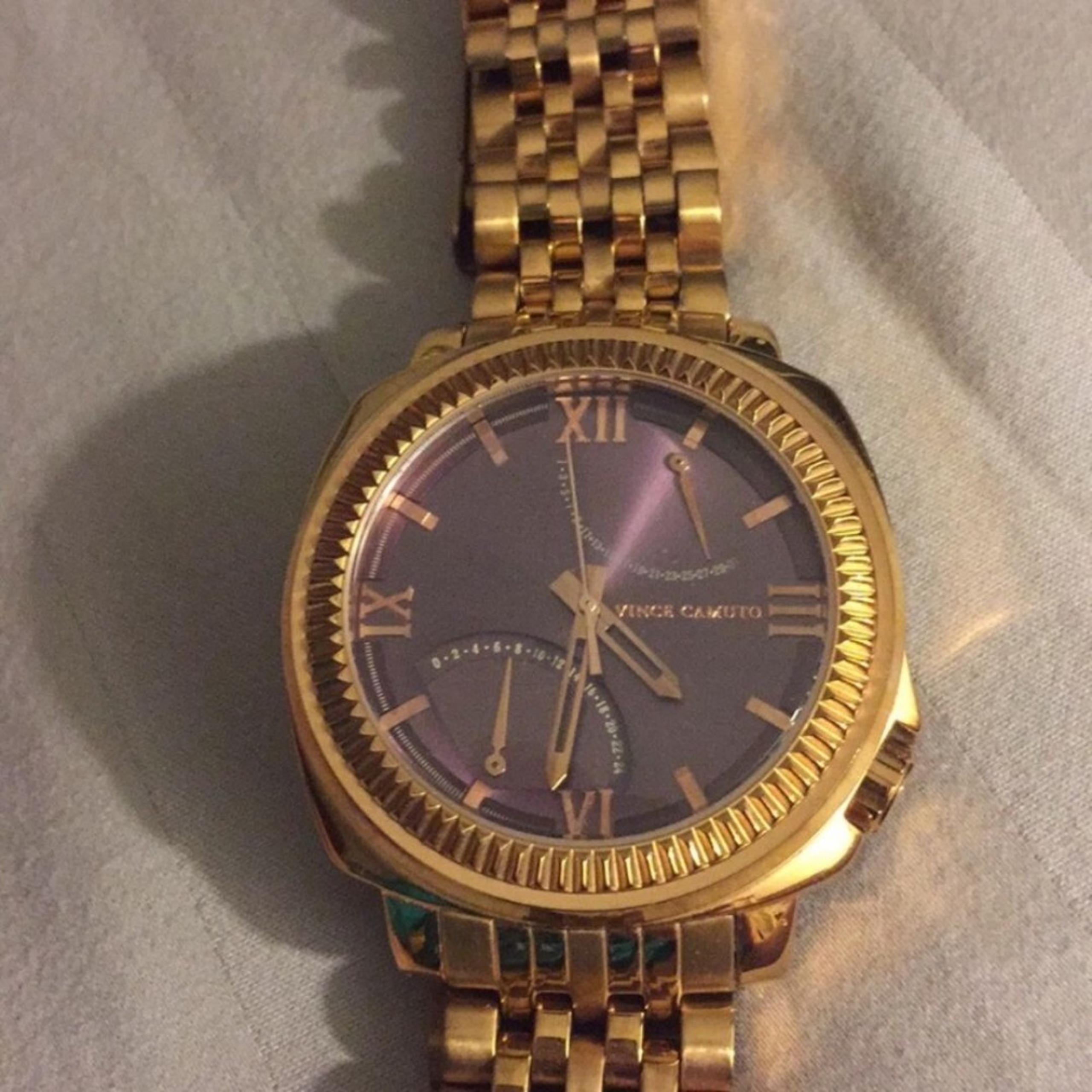 Vince Camuto men’s dress watch, gold tone, purple dial, linked metal band, OS