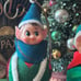 Lot of 3 vintage rubber elf head Christmas ornaments, setting on satin balls