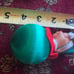 Lot of 3 vintage rubber elf head Christmas ornaments, setting on satin balls