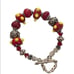 Red lamp work bead bracelet with silver and Swarovski crystals