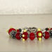 Red lamp work bead bracelet with silver and Swarovski crystals