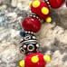 Red lamp work bead bracelet with silver and Swarovski crystals
