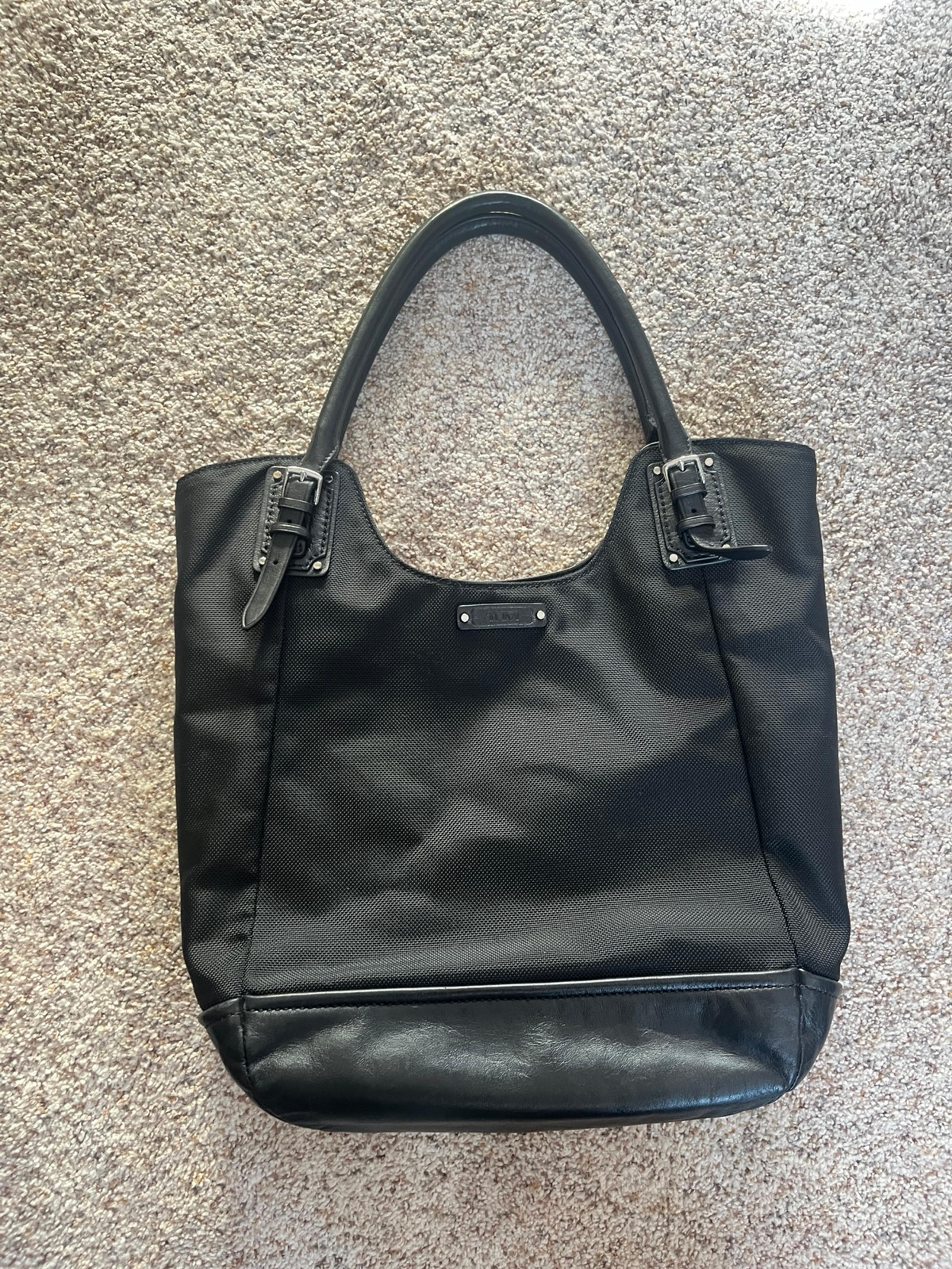 Black Tumi shoulder bag, leather and nylon