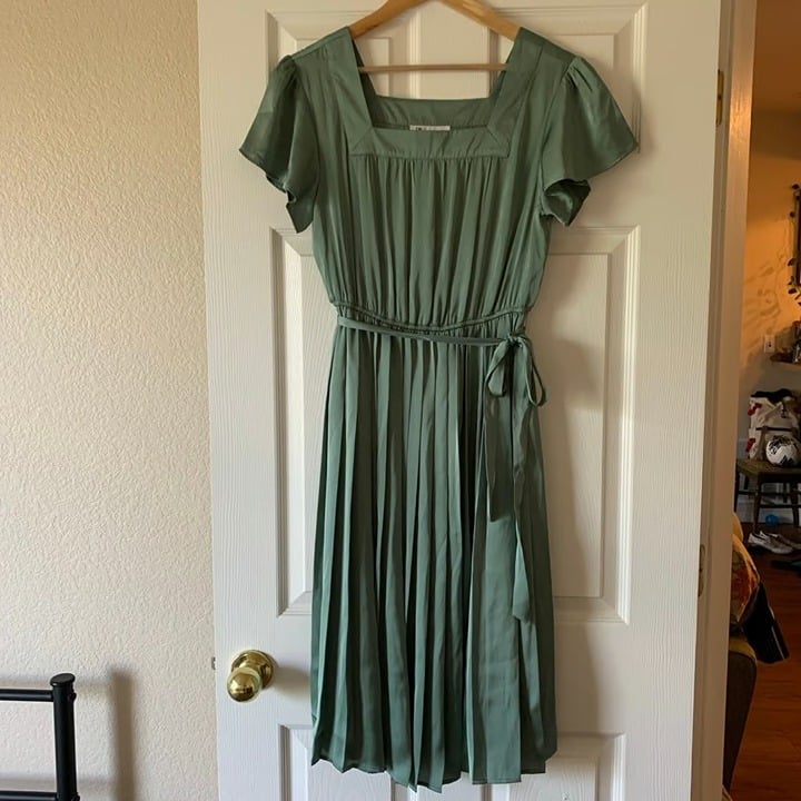 Satin dress with a pleated skirt