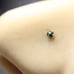 9kt. gold Nose piercing with a green emerald mark 9k solid gold New