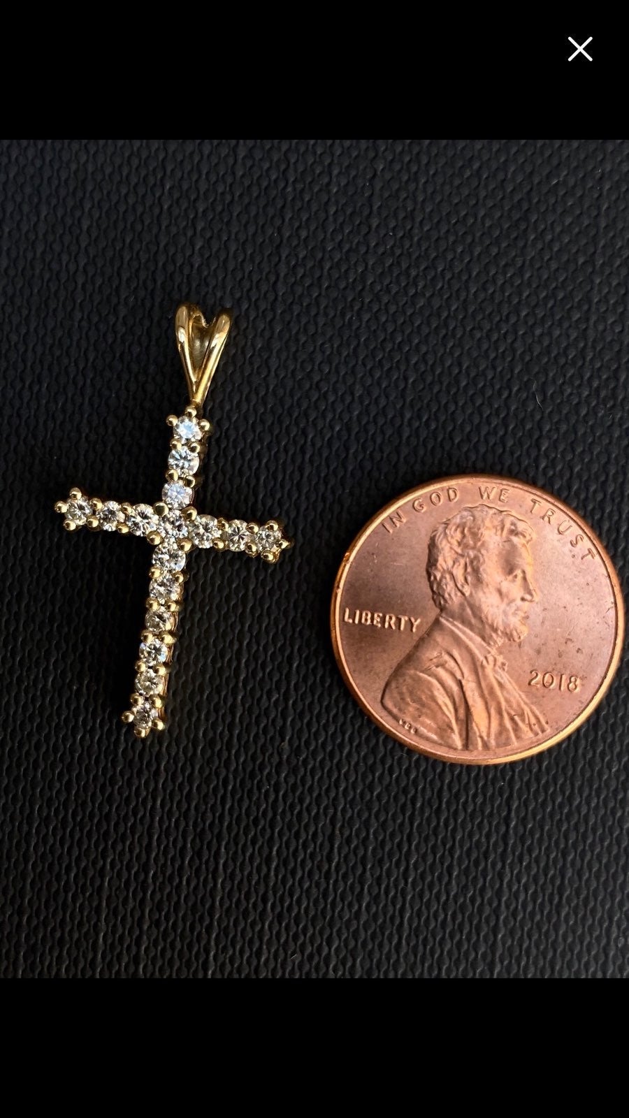 Gold cross with diamonds