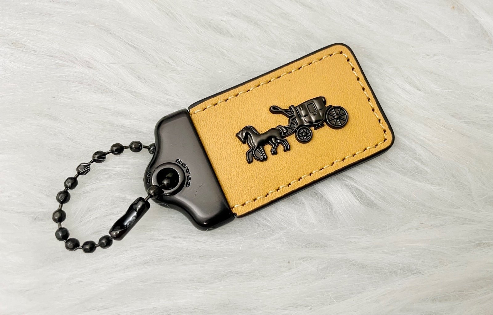 New Coach 1941 hang tag in Yellow