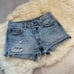 Levi’s High Rise Mom Cut Button Shorts