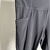 GUC Athleta Women’s Black Leggings Mesh Accent Pockets Ankle Length - Size Small