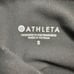 GUC Athleta Women’s Black Leggings Mesh Accent Pockets Ankle Length - Size Small