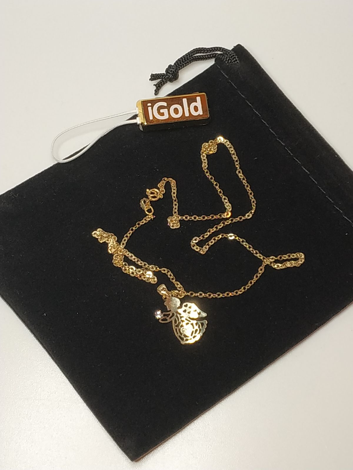 375%° solid yellow gold chain, with angel charm