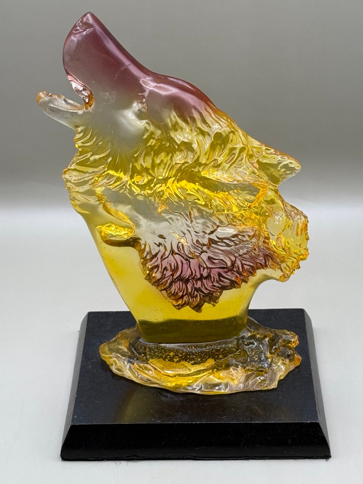 Vintage Amber Lucite Howling Wolf Statue With Brownish Purple & Yellow Accents