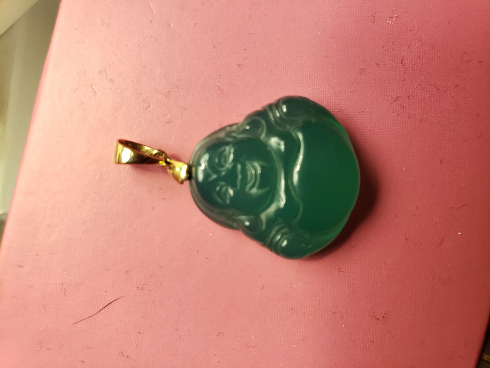 Jade buddha pendant