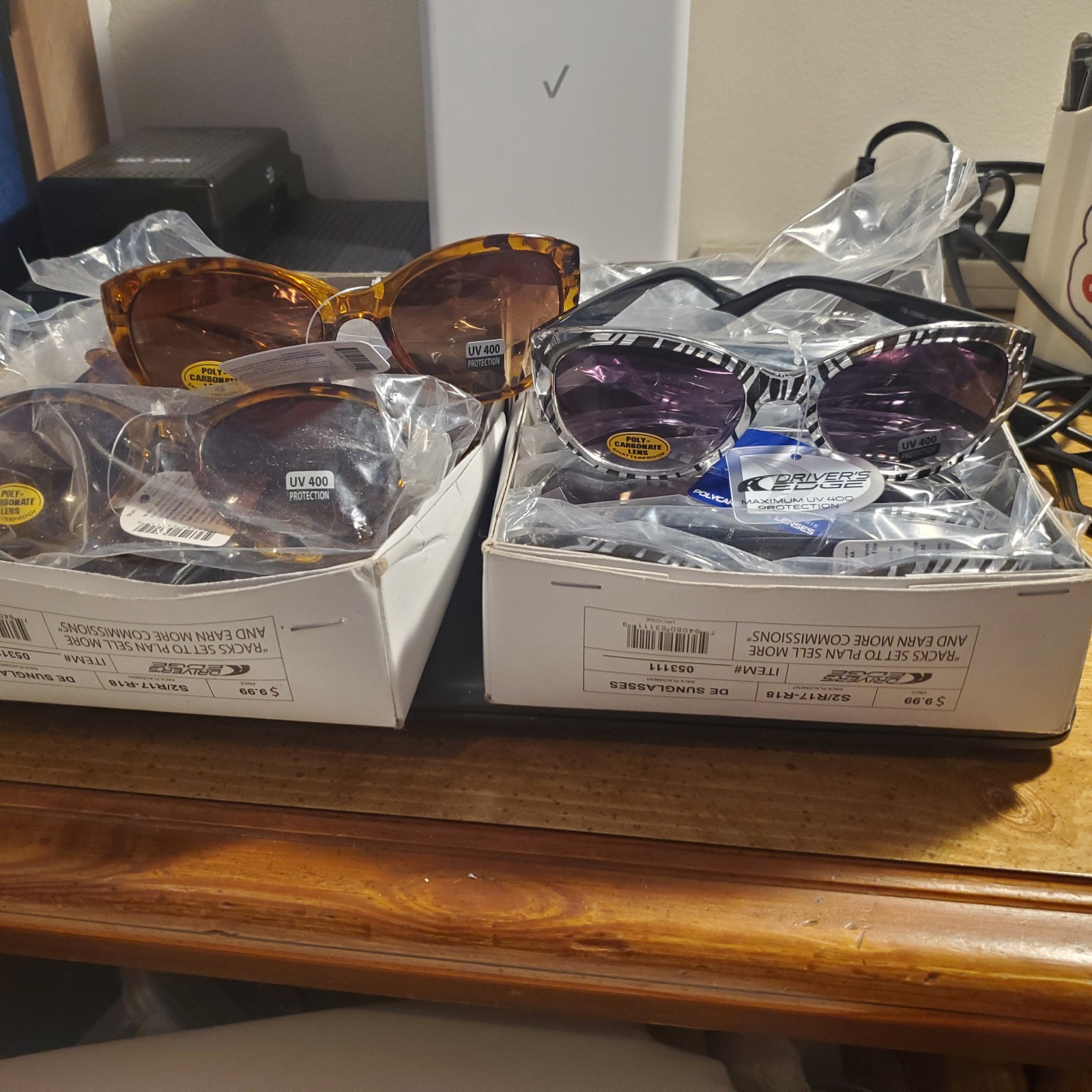 16 pairs of brand new sunglasses