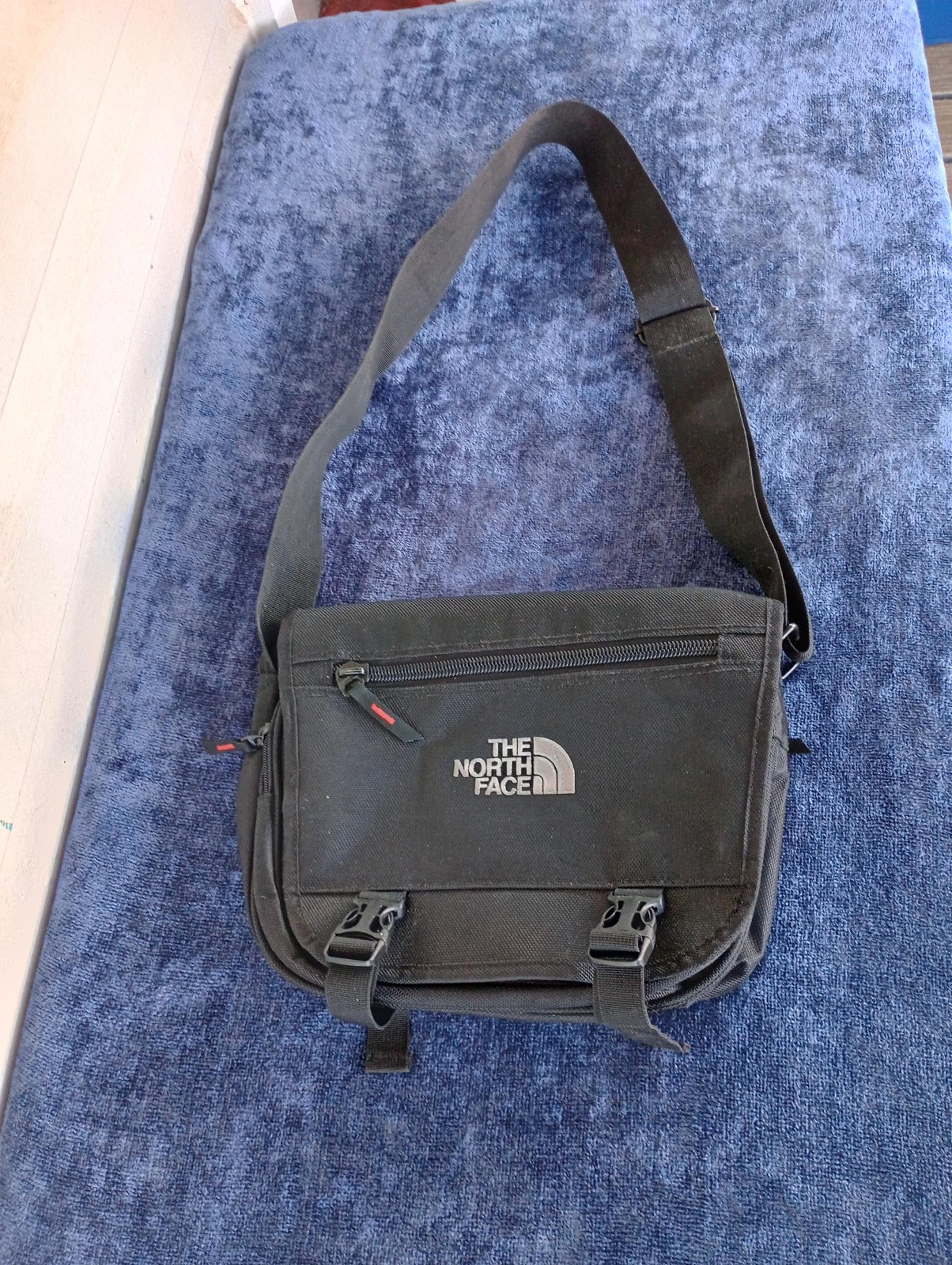 The North Face black messenger bag