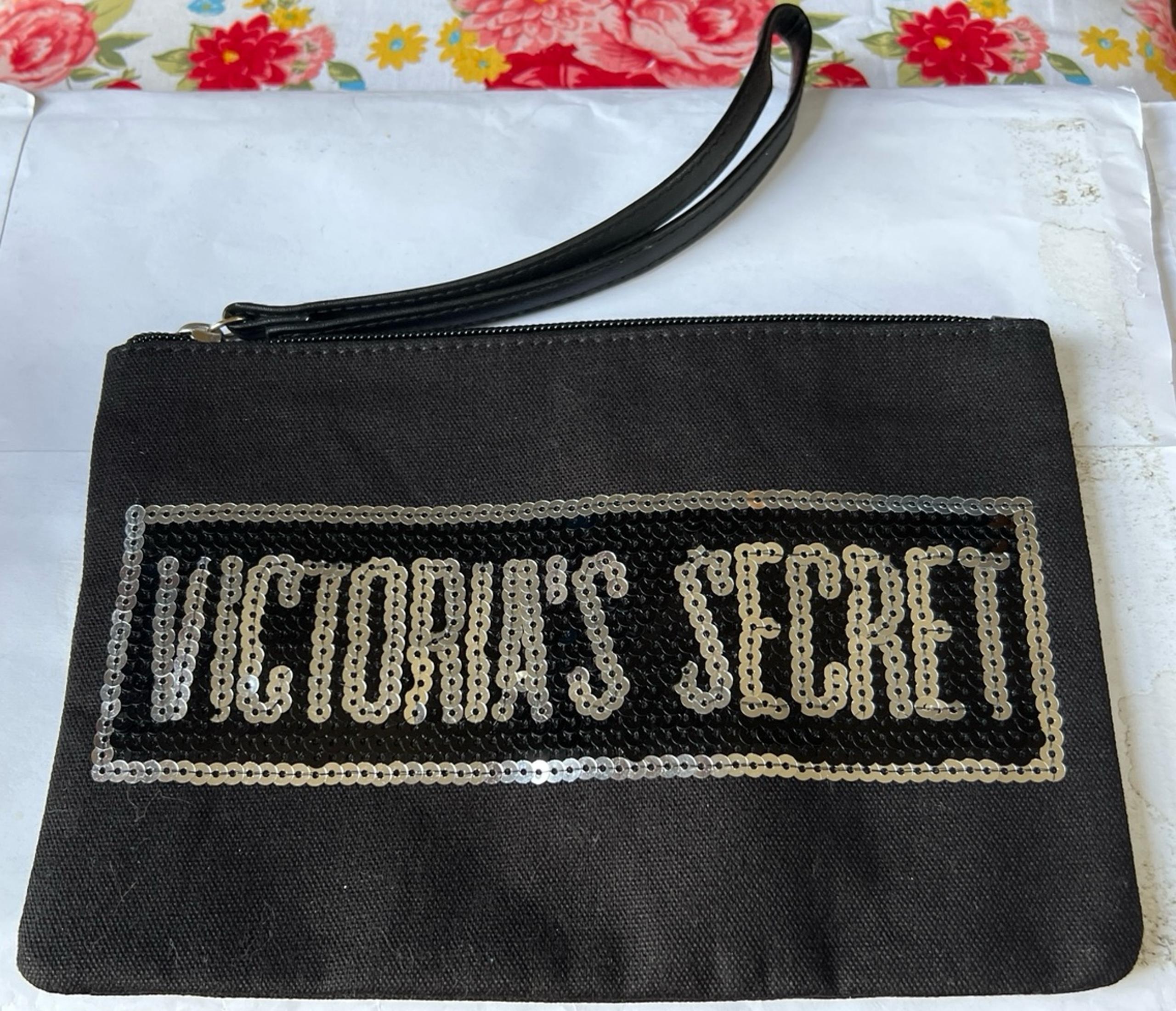 Victoria’s Secret canvas w/silver sequins wristlet cosmetic bag EUC zip closure