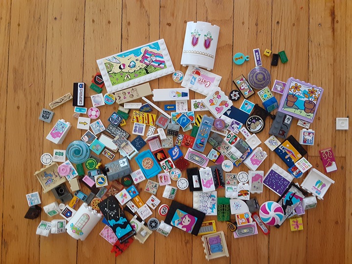 200 specialty Lego pieces with sticker decals space, pets, friends, food