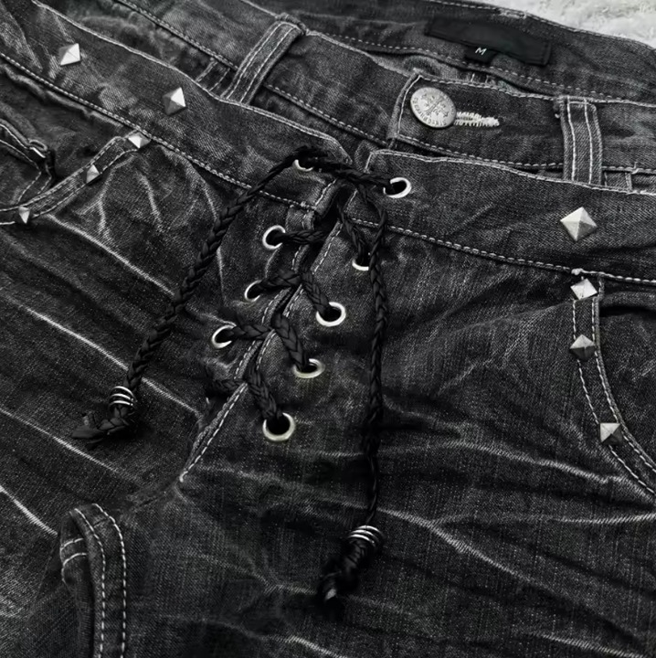 Washed/distressed punk flared jeans with lace up front rise