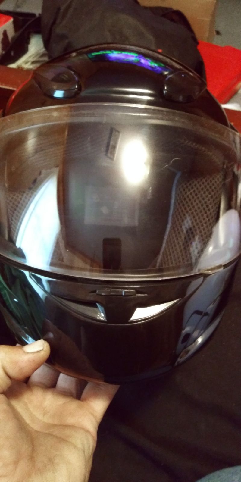 Black motorcycle helmet has been use few