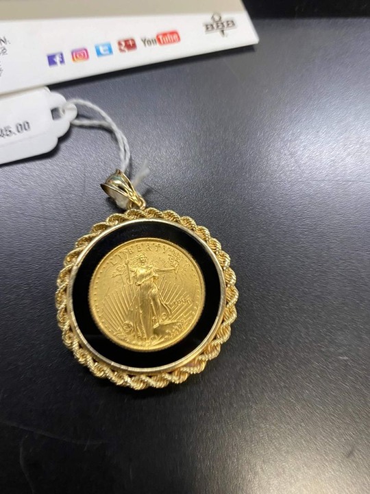 gold eagle liberty gold pendant