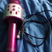 A pink karaoke microphone