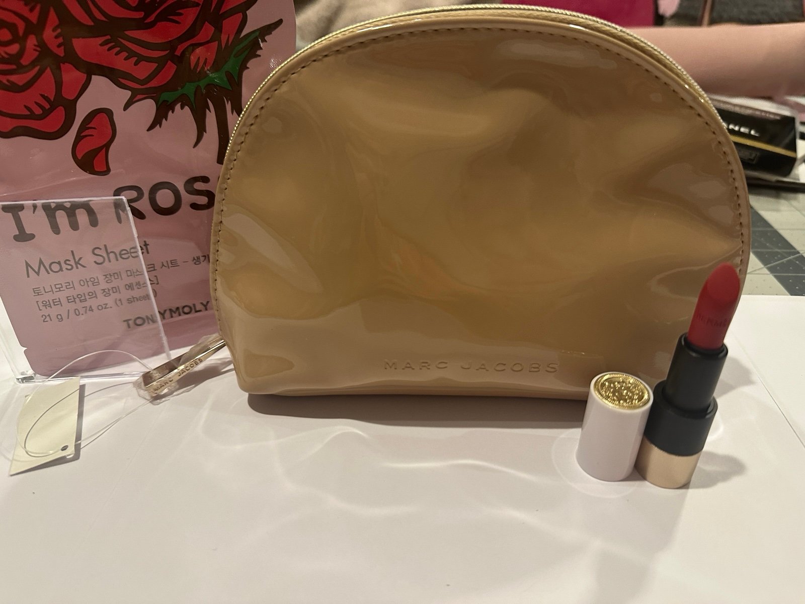 Hermes Lipstick, Marc Jacobs Makeup Pouch, and Vitalizing Facial Sheet Bundle