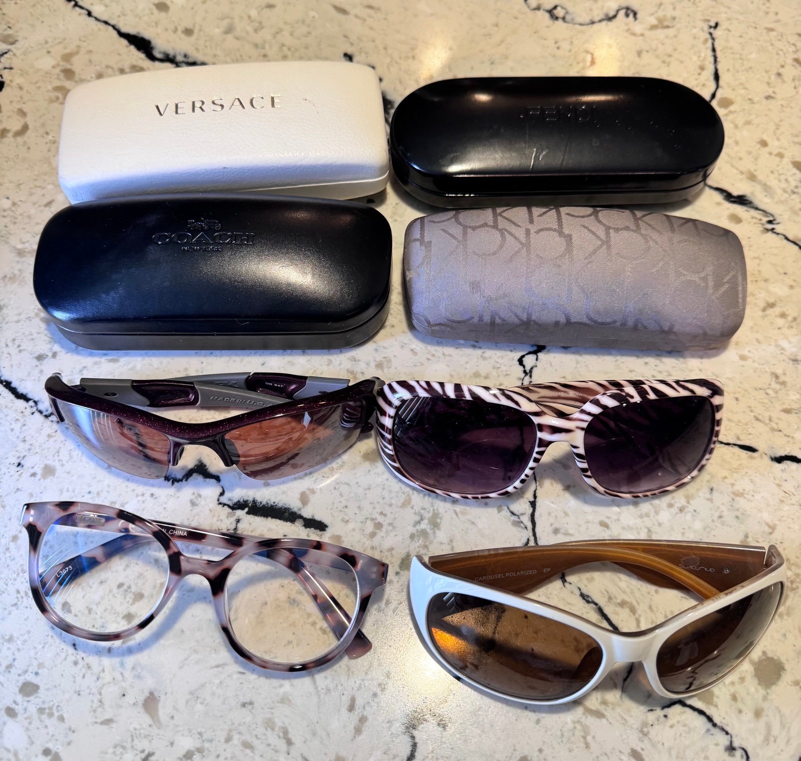 Lot of 4 Sunglasses and 4 Empty Cases