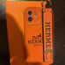 H Logo IPHONE 12 CASE SILICONE With Strap And Key Ring Orange Color